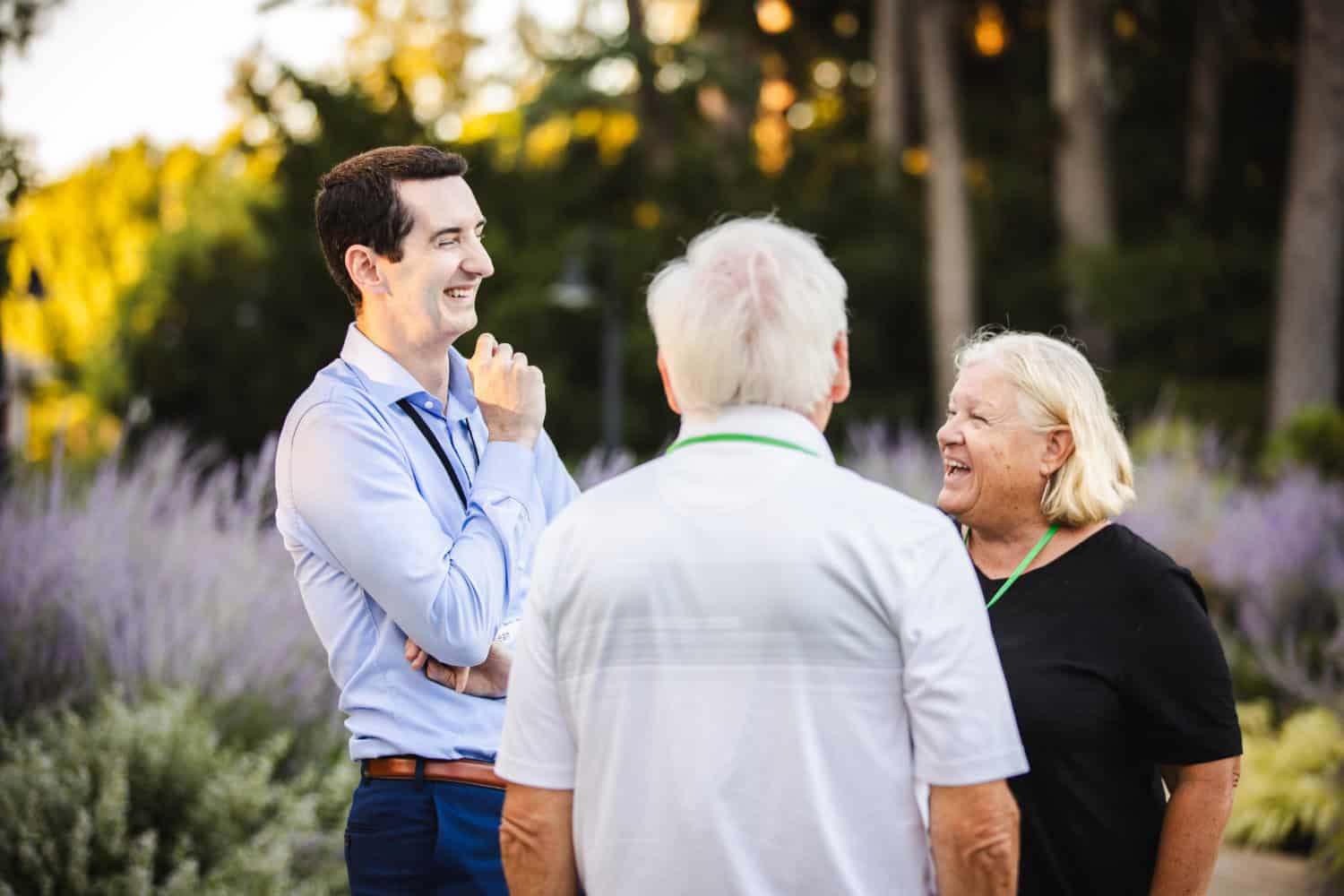 Sean laughing with clients at The Morton Arboretum
