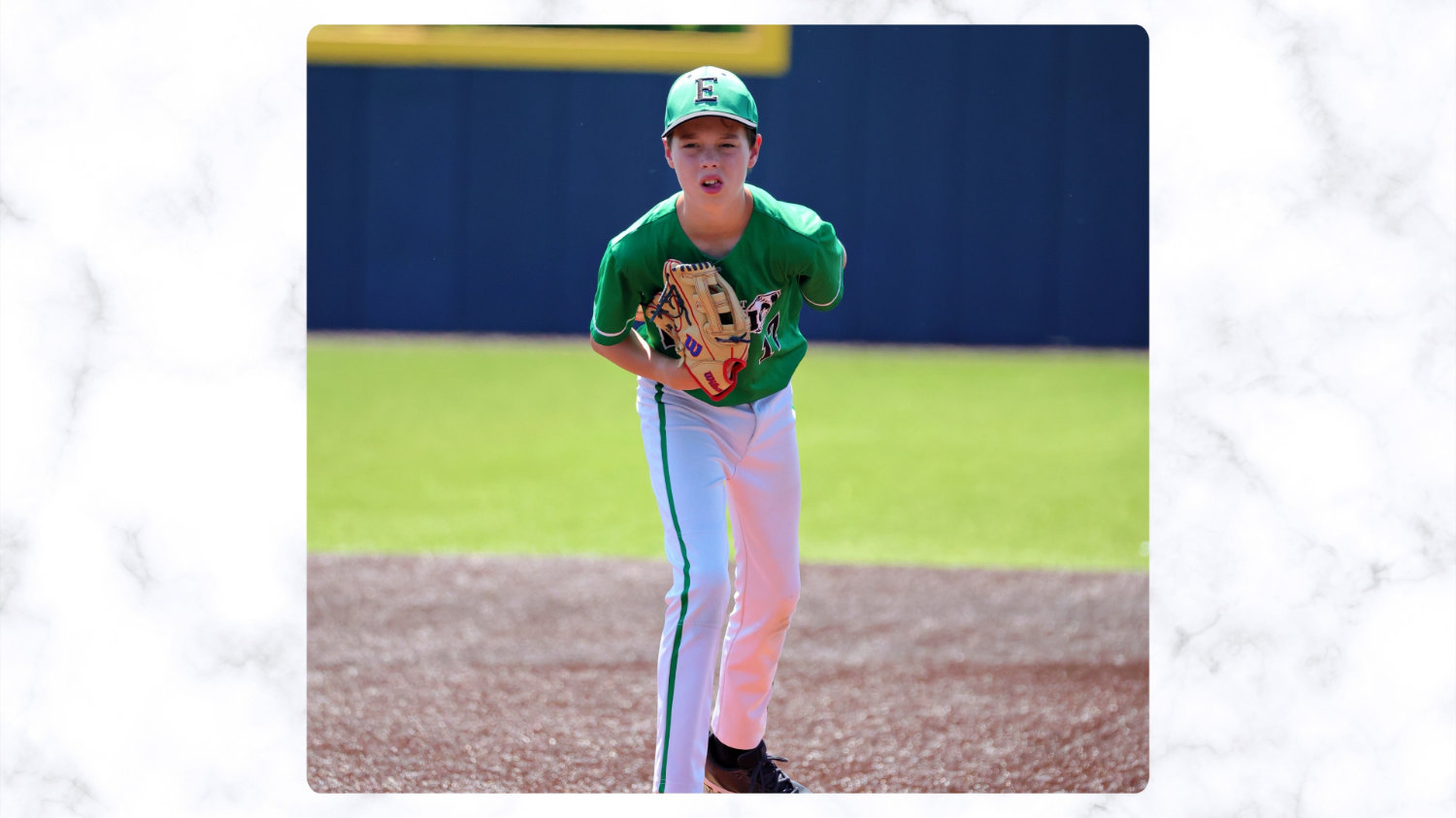 Erin's son pitching in a baseball tournament